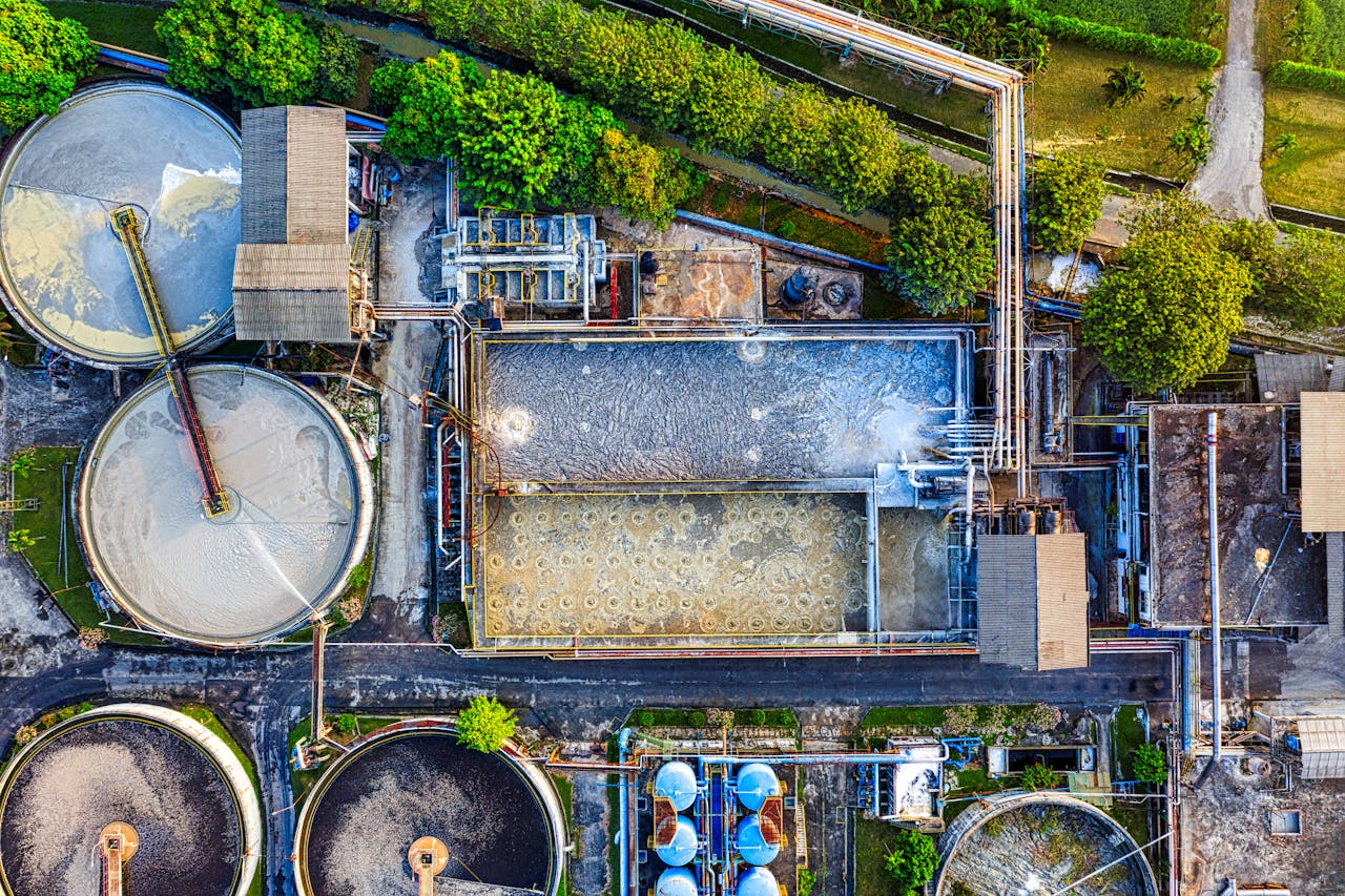 Top-down view of an industrial waste management facility in Serang, Indonesia, highlighting various processing tanks.